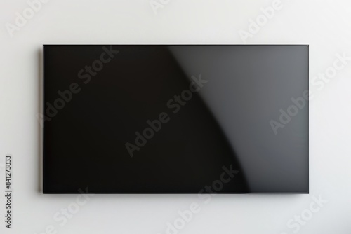 Photo of a blank black acrylic sign rectangle.