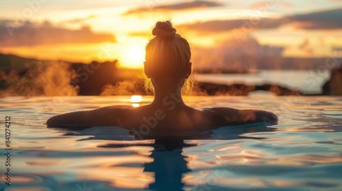 Serene Woman Relaxing in Infinity Pool at Sunset with Steam Rising © aimodels24