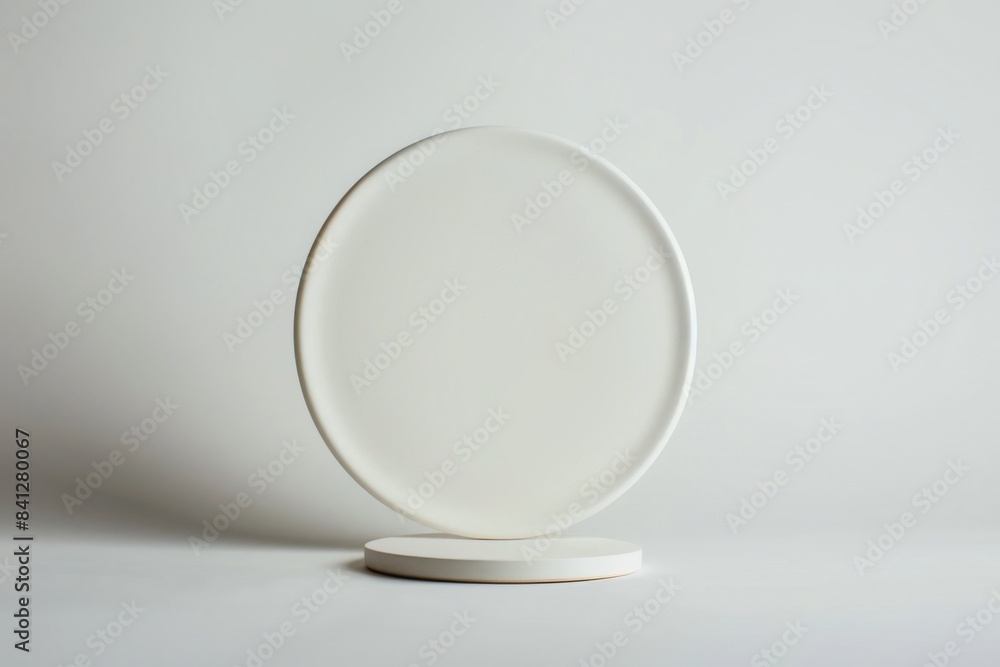 Blank White Circular Sign with Elegant Design Placed Outdoors Blank White Circular Sign with Elegant Design Placed Outdoors