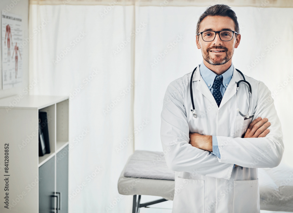 Health, portrait and mature man with arms crossed in hospital for healthcare, consulting or confidence. Medical, gastroenterology and doctor with stethoscope for endoscopy, pancreatitis or trust Health, portrait and mature man with arms crossed in hospital for healthcare, consulting or confidence. Medical, gastroenterology and doctor with stethoscope for endoscopy, pancreatitis or trust