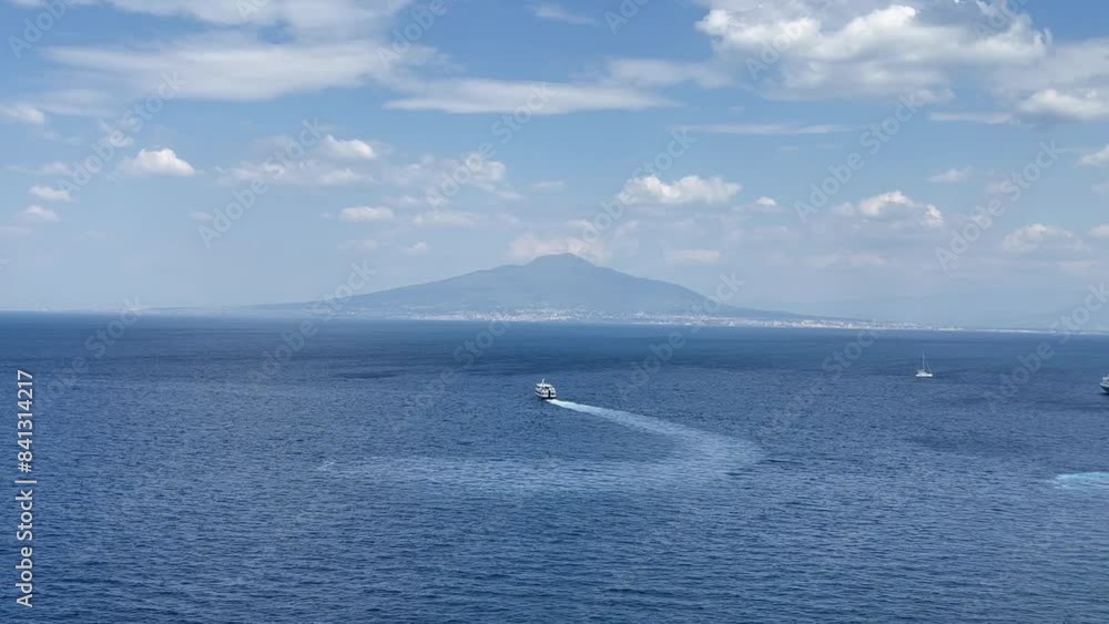 View of Vesuvius volcano and ferries from the observation deck in Sorrento View of Vesuvius volcano and ferries from the observation deck in Sorrento