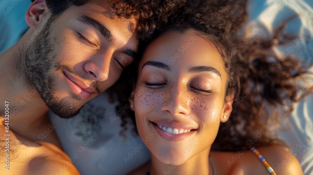 Man and lady rest on beach on summer morning date. A beautiful Australian holiday with a happy couple on the beach, enjoying nature and romance. Man and lady rest on beach on summer morning date. A beautiful Australian holiday with a happy couple on the beach, enjoying nature and romance.
