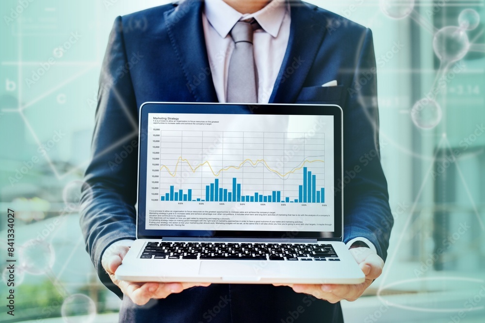 Fototapeta premium A businessman presenting some statistics
