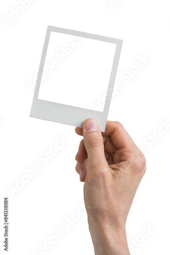 Fotografía Vintage Polaroid mockup in hand - clipping path, Studio shot of instant photo fr