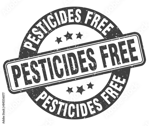 pesticides free stamp. pesticides free label. round grunge sign