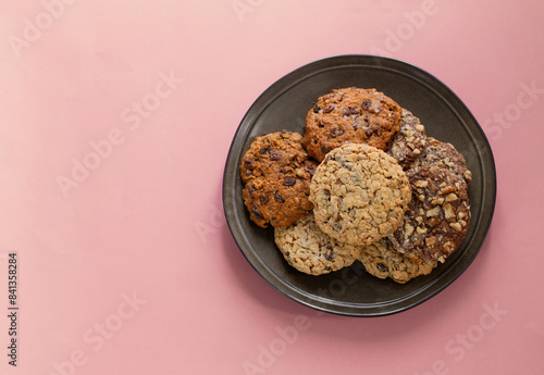 homemade cookies on plate  on pink background
