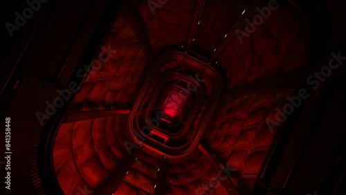 Camera flies and rotates inside red-lit technical corridor of a spaceship or a planetary module, moves towards exit. First person view of flying through spacecraft interior.      photo