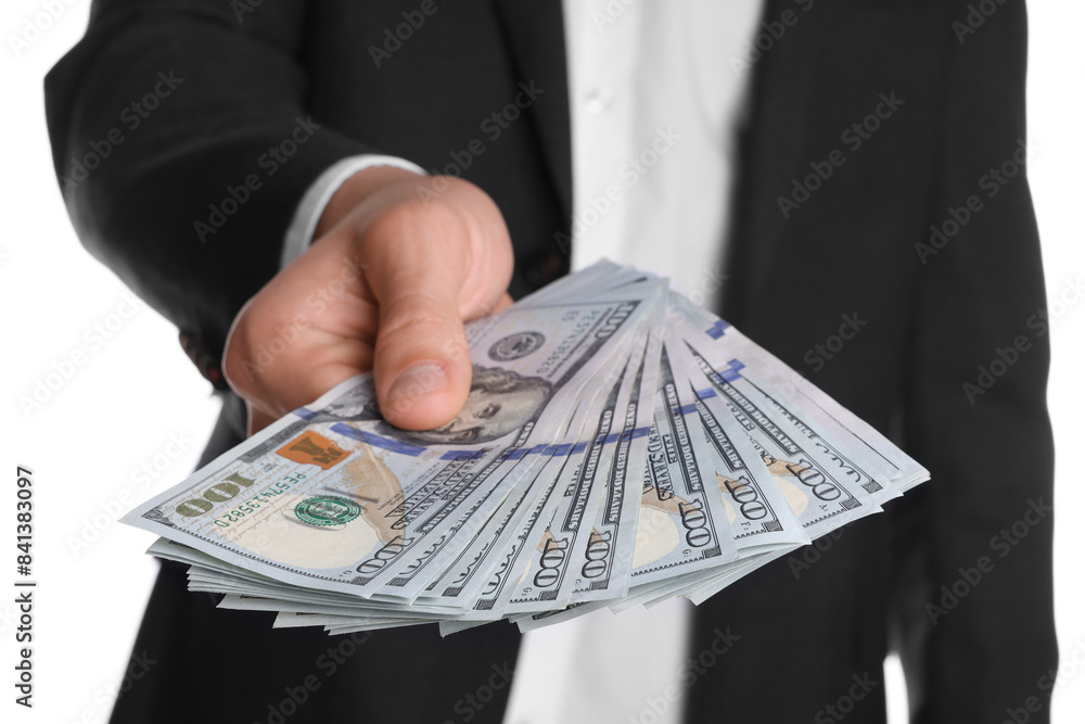 © New Africa - Money exchange. Man holding dollar banknotes on white background, closeup