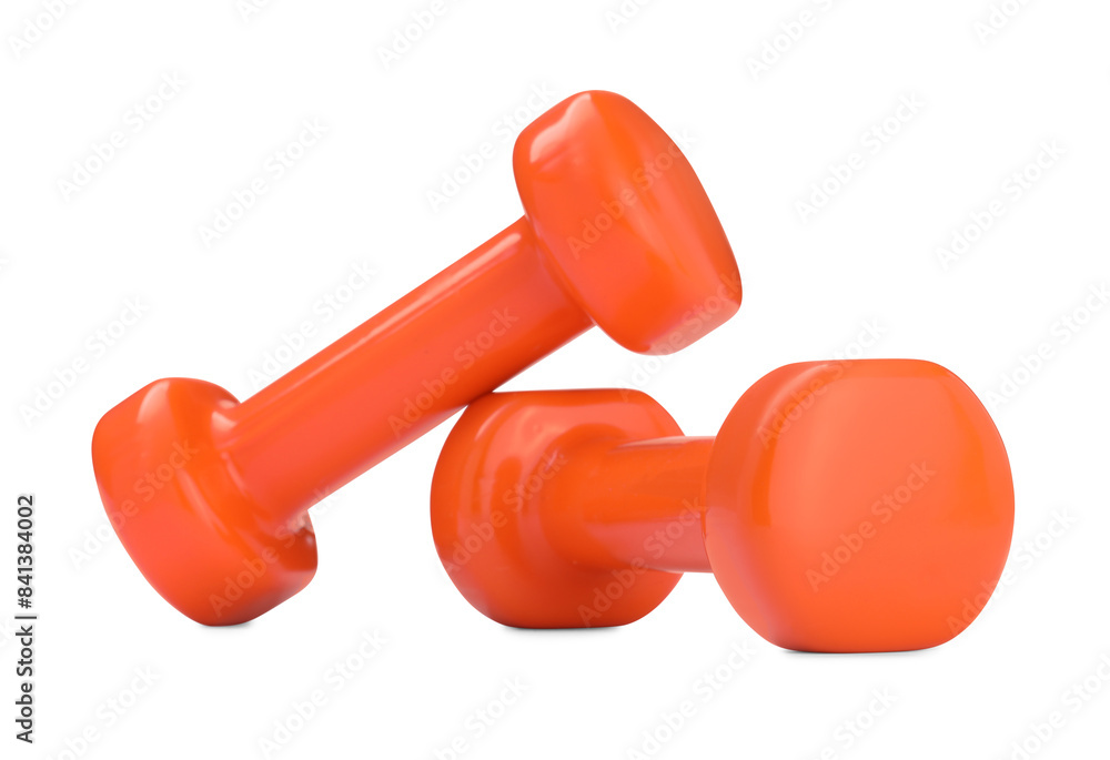 Orange dumbbells isolated on white. Sports equipment Orange dumbbells isolated on white. Sports equipment