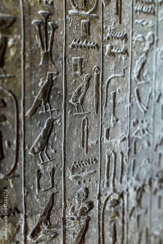 Intricate hieroglyphs on interior wall of Khufu Pyramid, ancient inscriptions photo