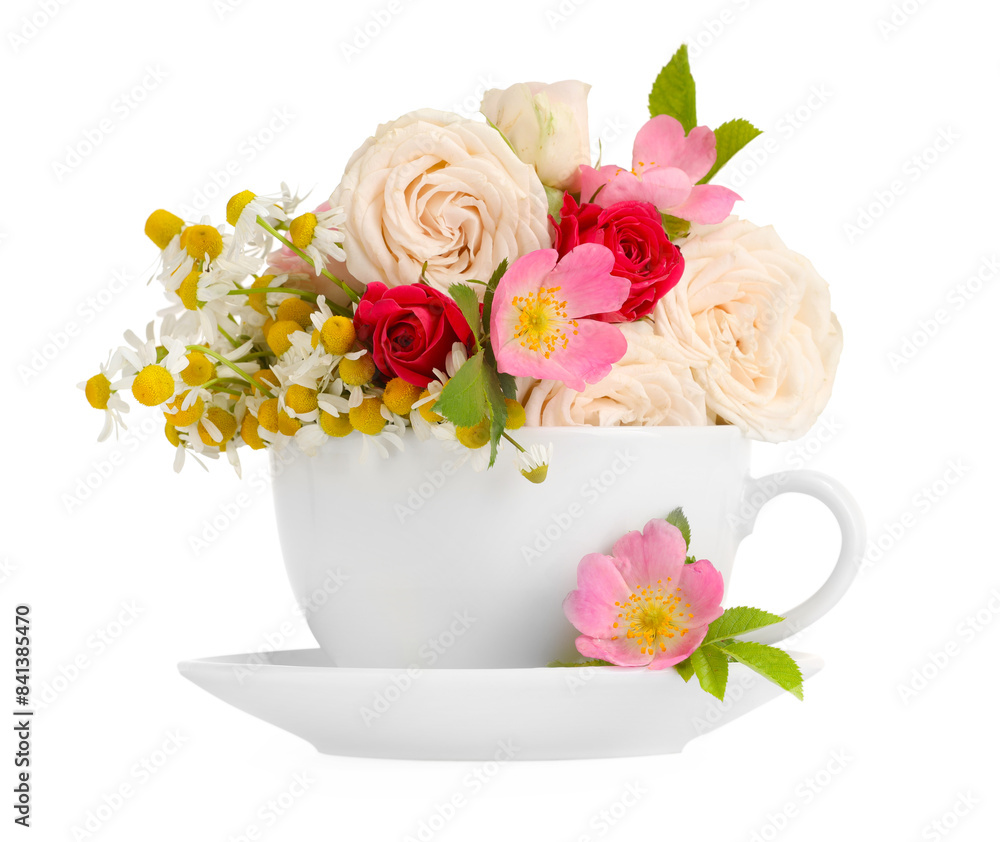 Aromatic herbal tea in cup with different flowers isolated on white Aromatic herbal tea in cup with different flowers isolated on white