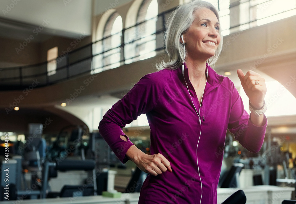 Happy, senior woman and running on treadmill for wellness, exercise, and fitness in retirement. Female person, excited and training in gym for cardio workout, physical vitality and body strength Happy, senior woman and running on treadmill for wellness, exercise, and fitness in retirement. Female person, excited and training in gym for cardio workout, physical vitality and body strength