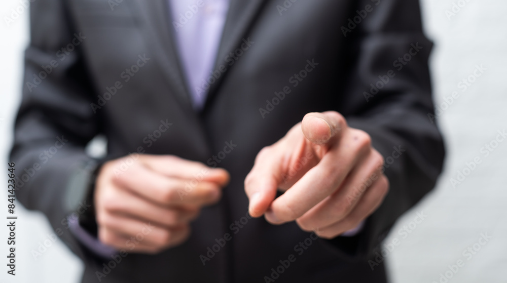Fototapeta premium businessman touching an imaginary screen with clipping path isolated on white background