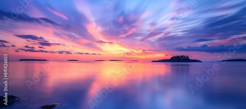 Beautiful widescreen sunrise with textured sky in purple colors.