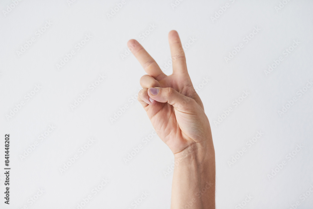 Peace, hands or person in studio mockup for freedom, vote or voice, opinion or thank you on white background. V, emoji or model with cool finger gesture for love, support or hippie, greeting or hello Peace, hands or person in studio mockup for freedom, vote or voice, opinion or thank you on white background. V, emoji or model with cool finger gesture for love, support or hippie, greeting or hello