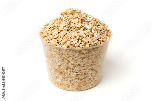Bowl of instant oatmeal isolated on white background. Oatmeal is oats that have been ground or processed, can be cooked quickly within a few minutes, add hot water or warm milk and eat for breakfast.
