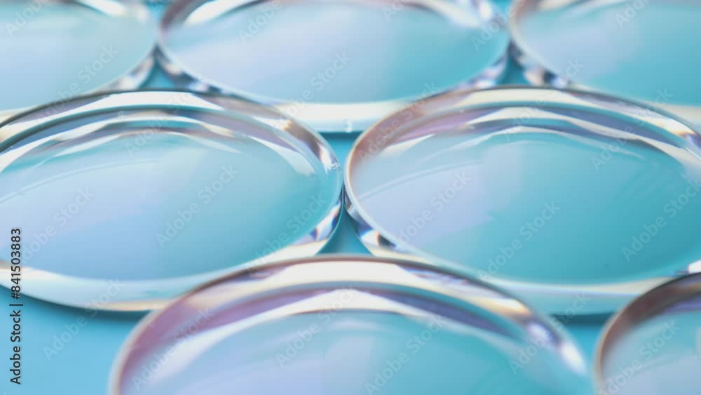 Eyeglasses lens production industry, close-up eyeglasses lenses, eyeglasses lenses, eyeglasses lenses, eyeglasses store business concept Eyeglasses lens production industry, close-up eyeglasses lenses, eyeglasses lenses, eyeglasses lenses, eyeglasses store business concept
