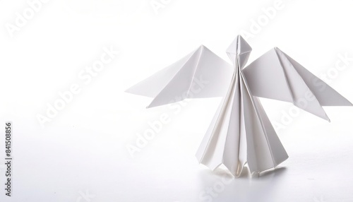 religion  spiritual  God  Jesus concept paper origami isolated on white background of an Angel with wings. simple starter craft for kids for weekend arts and crafts entertainment