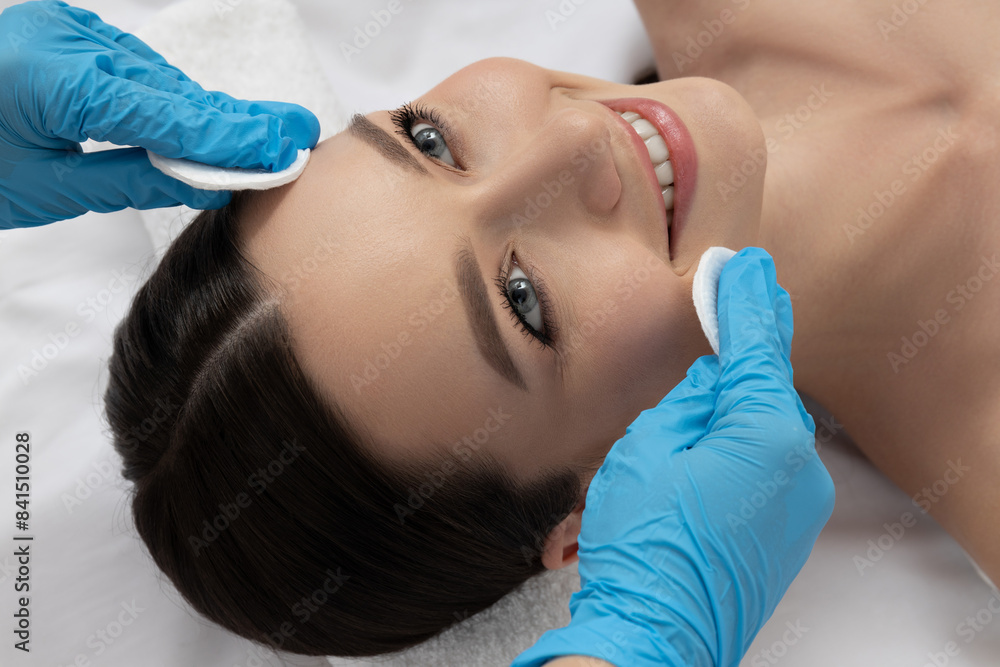 An attractive brunette at an appointment with a beautician An attractive brunette at an appointment with a beautician