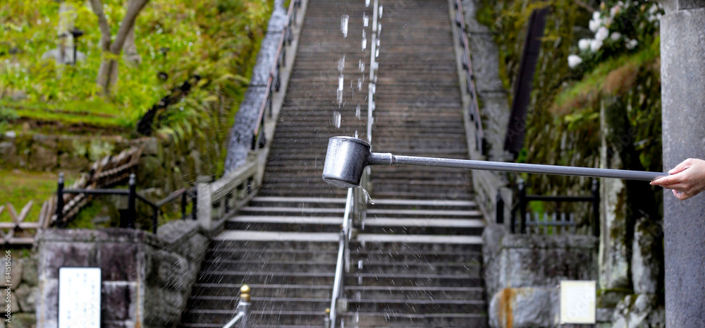 Water from the Otowa waterfall. Kiyomizu-dera temple in Kyoto, Japan Water from the Otowa waterfall. Kiyomizu-dera temple in Kyoto, Japan