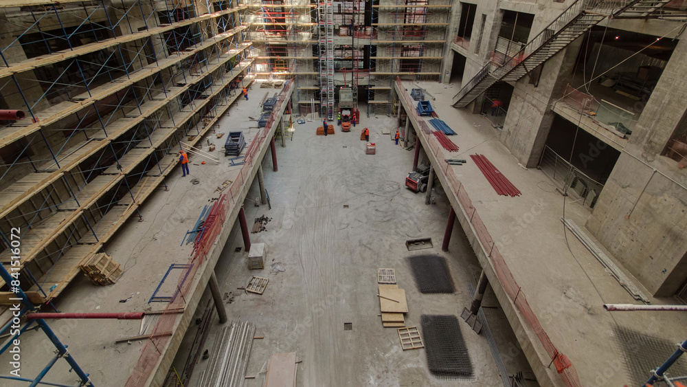 Construction equipment material with scaffolding and tools inside the floor of high rising building timelapse Construction equipment material with scaffolding and tools inside the floor of high rising building timelapse
