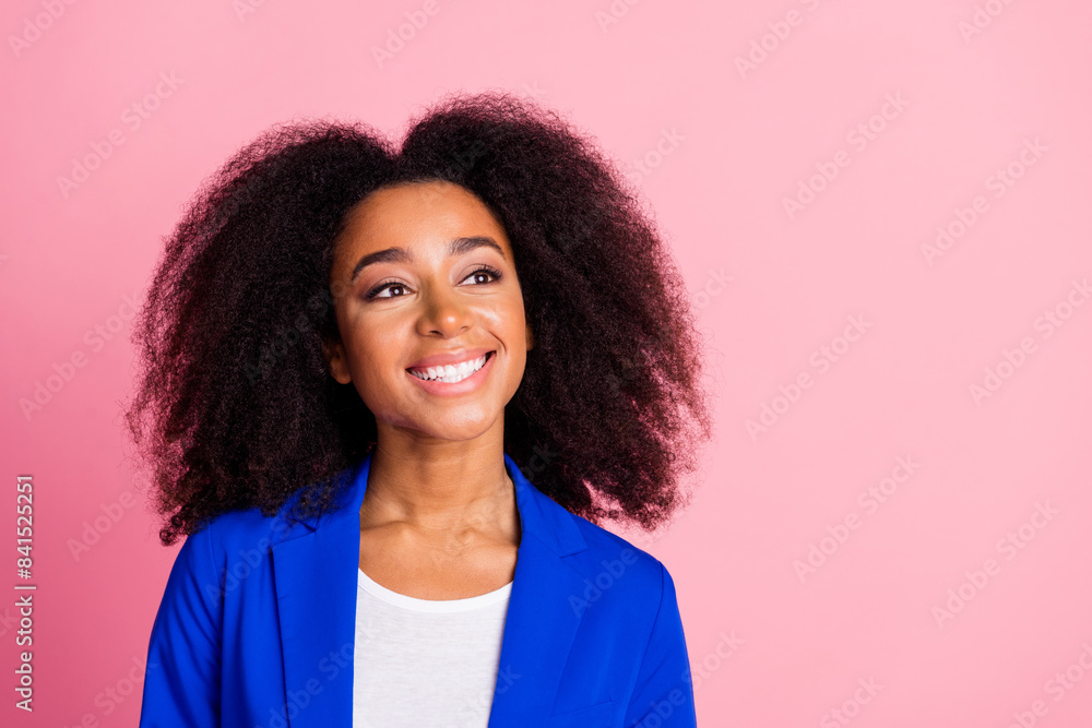 Photo of cheerful nice woman with perming coiffure wear blue jacket look at discount empty space isolated on pink color background Photo of cheerful nice woman with perming coiffure wear blue jacket look at discount empty space isolated on pink color background