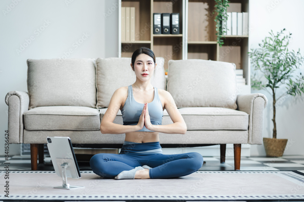 Asian healthy woman workout at home, exercise, fit, doing yoga, home fitness concept. Asian healthy woman workout at home, exercise, fit, doing yoga, home fitness concept.