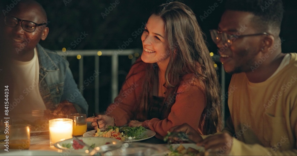 Fototapeta premium Friends, talking and dinner at party, patio and happy for conversation, food and new years eve celebration. Woman, men and group at table with chat, memory and night with story, diversity and event