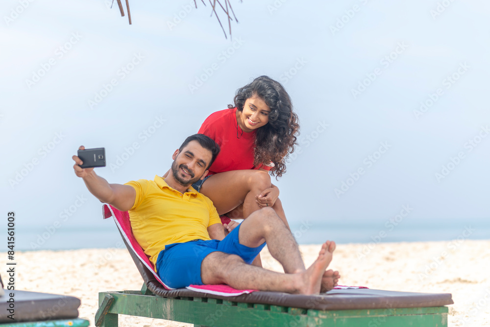 Fototapeta premium Couple/Man relaxing at the beach