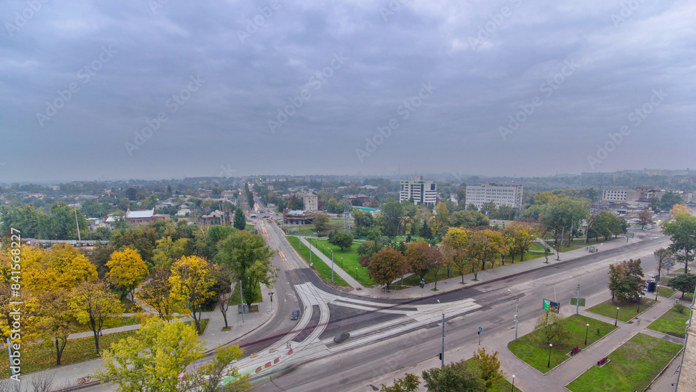Road intersection with reconstructed tram tracks aerial panoramic timelapse. Road intersection with reconstructed tram tracks aerial panoramic timelapse.