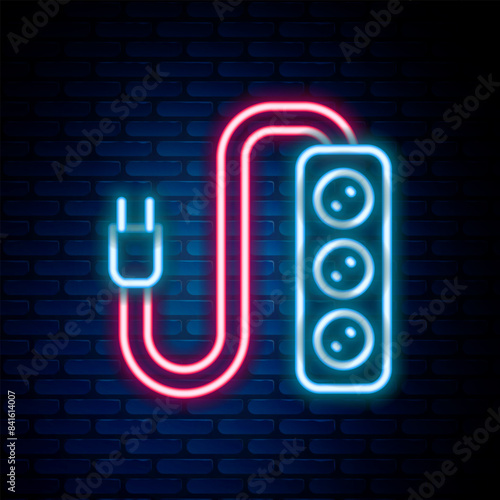 Glowing neon line Electric extension cord icon isolated on brick wall background. Power plug socket. Colorful outline concept. Vector