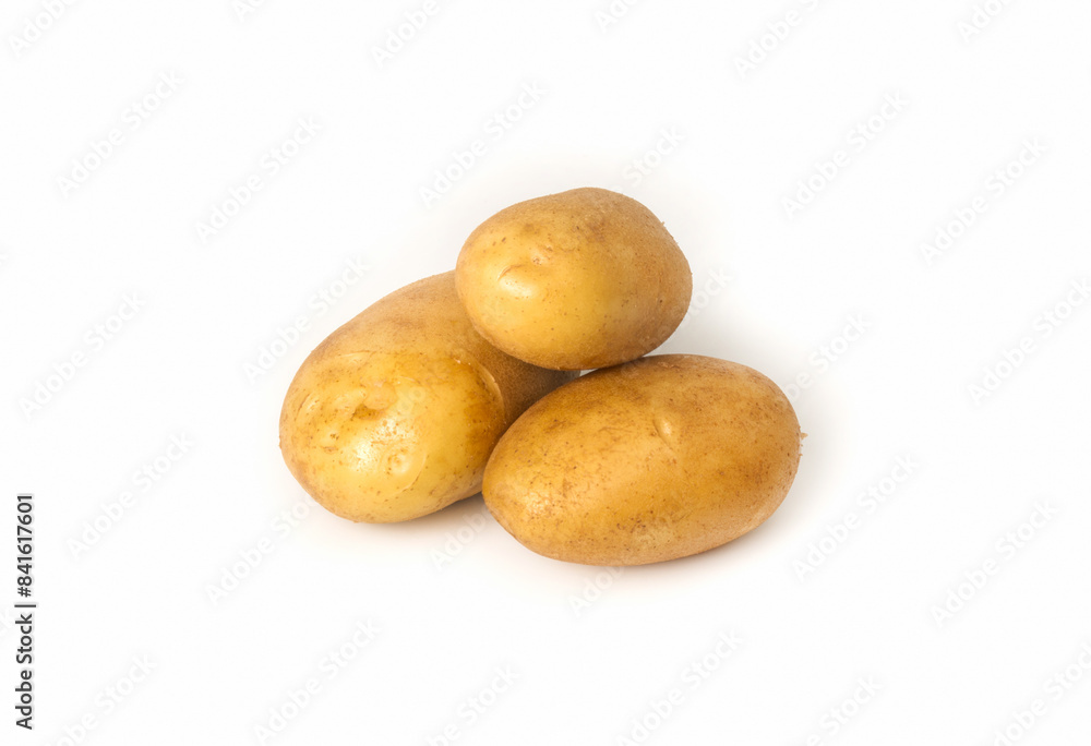 Three white potatoes on a white isolated background. Potato harvest Three white potatoes on a white isolated background. Potato harvest