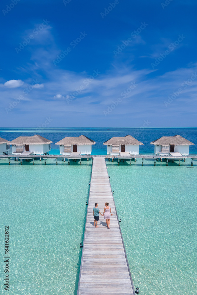 happy couple on honeymoon trip in Maldives, beach holidays travel happy couple on honeymoon trip in Maldives, beach holidays travel