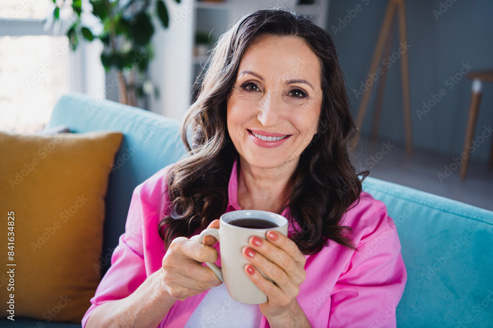 Photo of lovely cute senior woman enjoying weekend vacation drinking fresh hot tea comfy indoors Photo of lovely cute senior woman enjoying weekend vacation drinking fresh hot tea comfy indoors