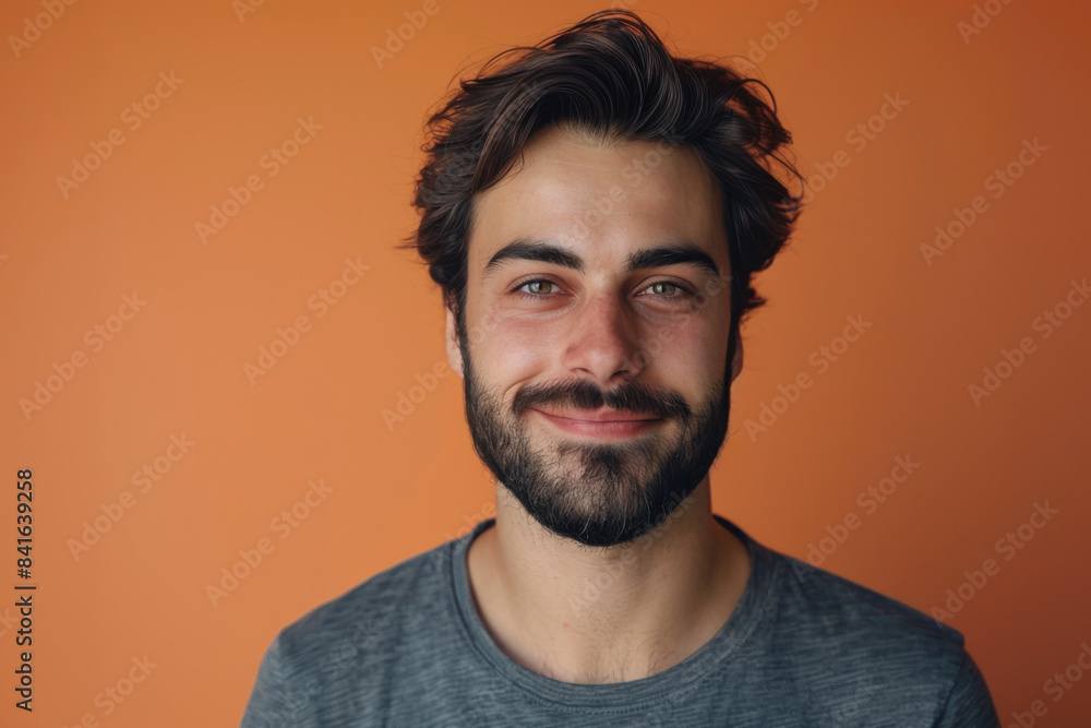 Fototapeta premium A close up portrait of a young man with a subtle smile