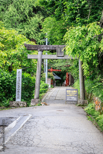 Tranquil Pathway to the Traditional Shinto Shrine, Iimori Hill, Aizuwakamatsu, Japan photo