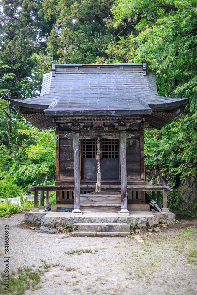 Tranquil Shinto Shrine in Verdant Forest, Iimori Mountain, Aizuwakamatsu, Japan Tranquil Shinto Shrine in Verdant Forest, Iimori Mountain, Aizuwakamatsu, Japan