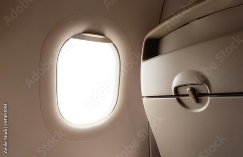 Airplane window from inside Passenger plane POV looking out , Isolated Windows Plane in back seat photo