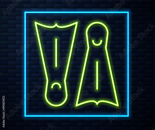 Glowing neon line Rubber flippers for swimming icon isolated on brick wall background. Diving equipment. Extreme sport. Diving underwater equipment. Vector