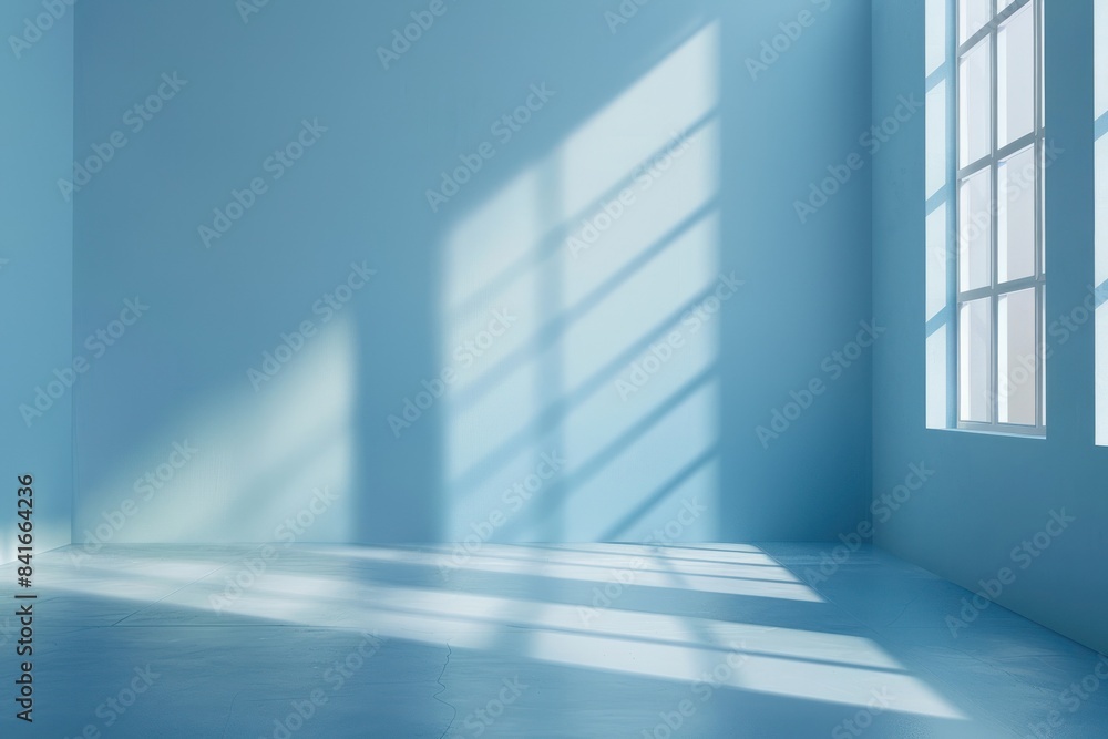 Fototapeta premium Blue room with window shadows on wall and floor
