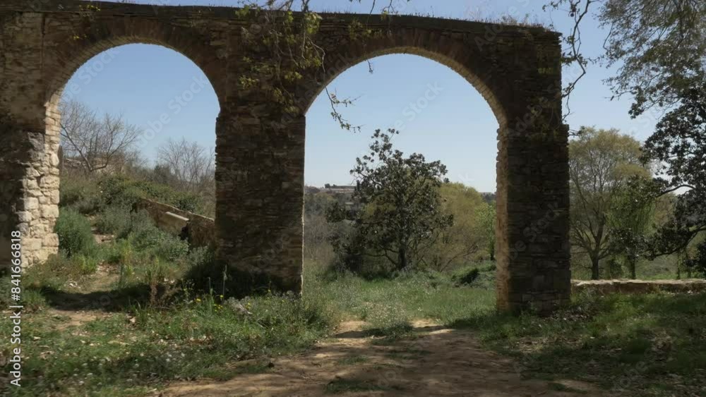 Gate from an aqueduct or bridge near Castell de Clasqueri European castle traveling with handheld brushless gimbal Gate from an aqueduct or bridge near Castell de Clasqueri European castle traveling with handheld brushless gimbal