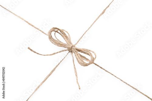 Linen rope string with bow isolated on white, top view