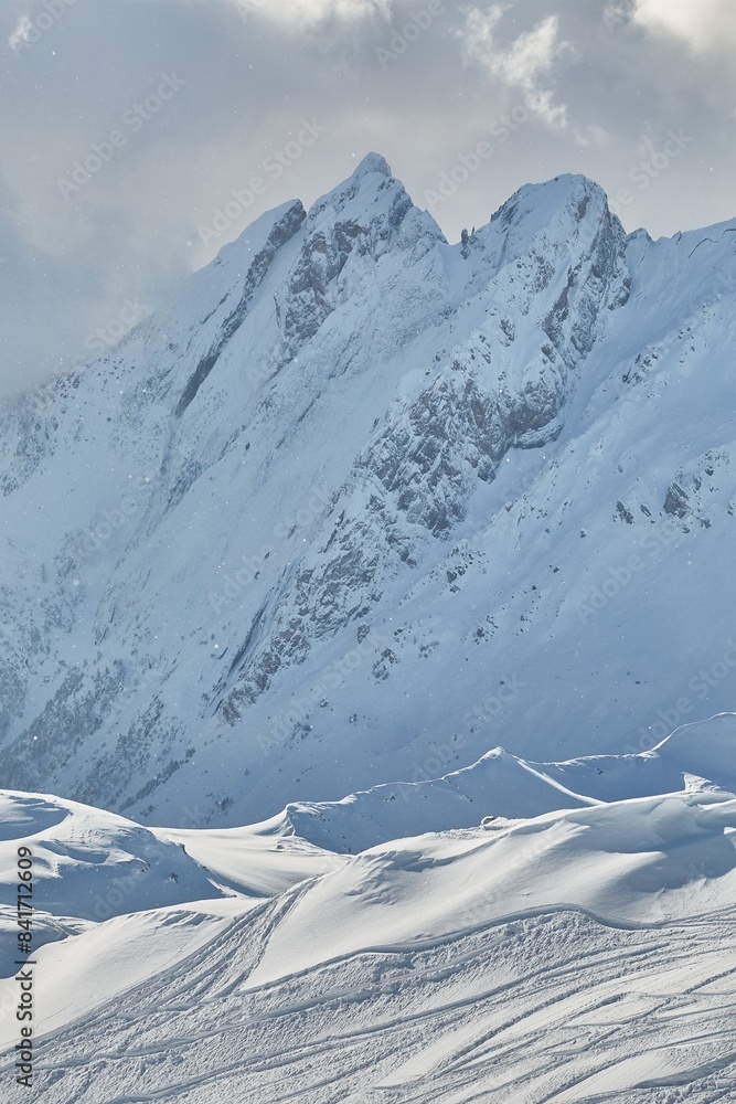 Fototapeta premium Winter high mountains in clouds
