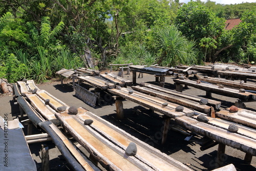 Ancient traditional salt production in Kusamba on the Bali island, Indonesia photo