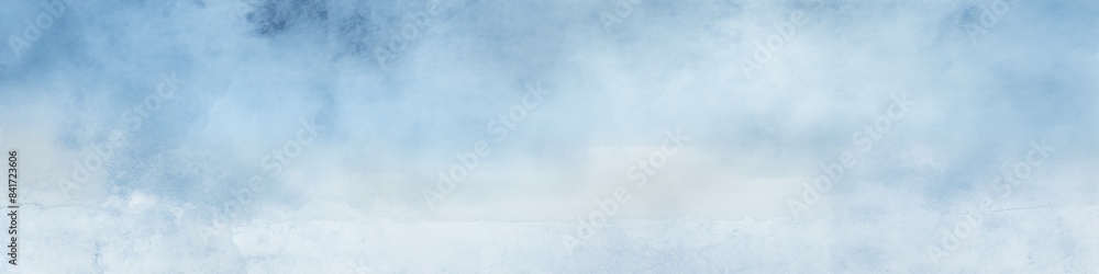 Abstract watercolor texture in shades of blue, resembling a misty atmospheric scene. Abstract watercolor texture in shades of blue, resembling a misty atmospheric scene.