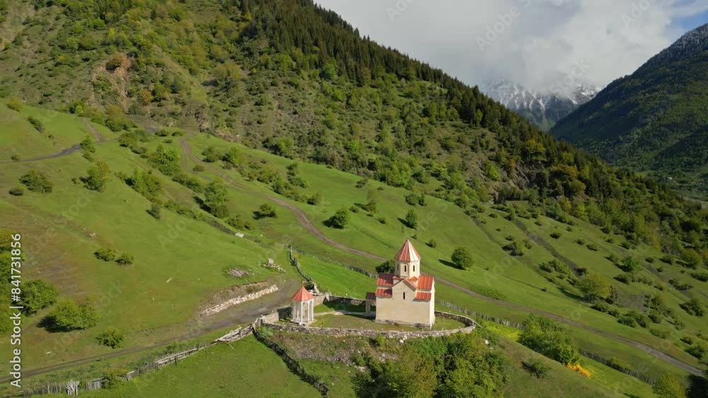 small church on alpine green meadow, backdrop snowy peak, , aerial view small church on alpine green meadow, backdrop snowy peak, , aerial view