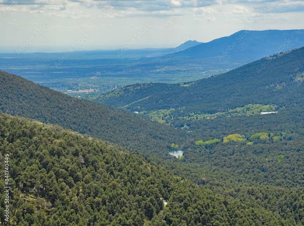 Fototapeta premium view of the fuenfria valley with cercedilla in the background