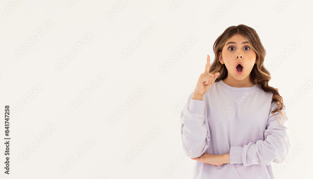 Image of excited young lady standing isolated over white background. Looking at camera have an idea. Image of excited young lady standing isolated over white background. Looking at camera have an idea.
