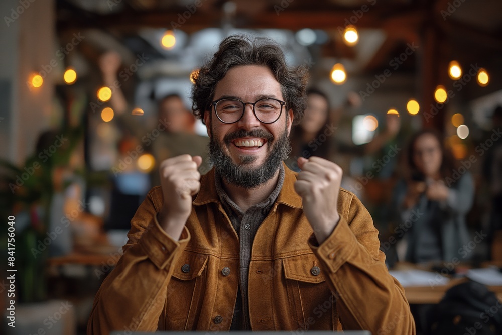 Man in cafe showing victory gesture Man in cafe showing victory gesture