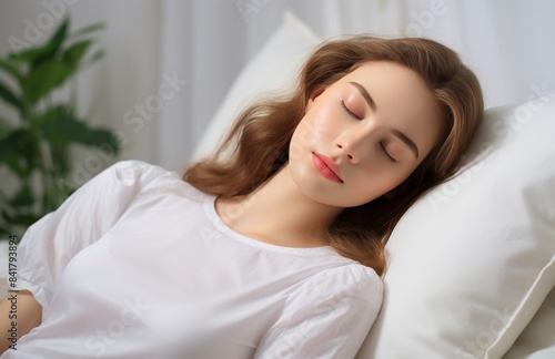 Woman Sleeping in Bed With White Bedding and Sheer Curtains